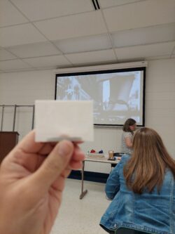 The focus is on the image on the screen behind the lithopane