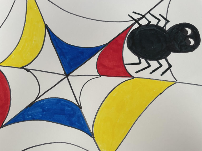 A happy spider sits on a color blocked Mondrian inspired web.